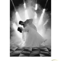 A timeless black and white shot capturing the romance of the first dance. I use dramatic lighting and effects like this fog machine to add that extra touch of magic to your reception or sangeet night.