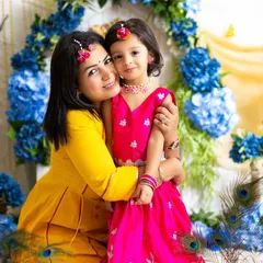 A sweet close-up of a mother and her "little Radha rani." These themed sessions are perfect for capturing beautiful cultural moments.