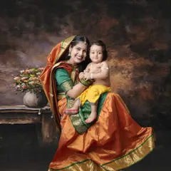 Jai Shri Krishna. A stunning, painterly portrait of a mother as Yashoda holding her own little Krishna, celebrating a timeless cultural story.