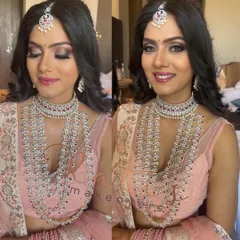 A beautiful before-and-after style image showing the client with eyes open and closed. This highlights the dramatic purple and silver glitter eyeshadow, paired with a soft pink lip and sparkling diamond jewellery.