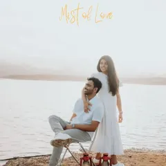 A romantic lakeside scene, with the couple using vintage lanterns as props. The warm glow of the lantern adds a magical, old-world touch to the evening light.
