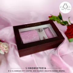 This accessory set features a soft pink paisley tie and pocket square with matching cufflinks. These exquisite details are designed to elevate your style and add a touch of personality to your formal wear.