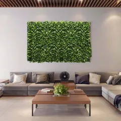 A great example of how a green wall can elevate a commercial space. For this modern lobby, I installed two distinct artificial gardens to add a touch of nature and sophistication where clients and visitors gather.