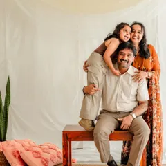 Who says studio portraits have to be stiff? In our Bangalore studio, we encourage play and laughter. This fun family pyramid is the perfect example of how we capture your family's loving and playful dynamics with a clean, classic backdrop.
