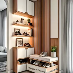 A compact and stylish entryway design perfect for apartments. This unit includes open shelves for display, closed cabinets, and a pull-out seating bench with concealed shoe storage underneath, making it incredibly space-efficient.