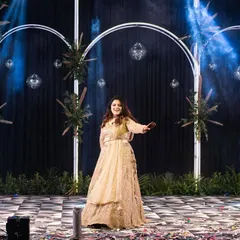 A solo performance on a beautifully decorated stage. I help coordinate with your event planners to ensure the choreography, lighting, and stage effects all work together perfectly.