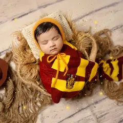 The magic is in the details. This Harry Potter themed newborn shoot is one of my favorites to create for fellow fans.