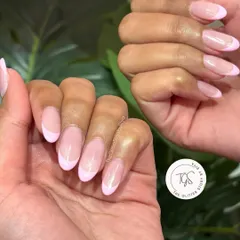 A soft and pretty pastel pink French manicure. This is a subtle and modern update to the classic, perfect for an everyday chic look.