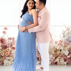 For maternity shoots, you deserve to feel like a queen. Here, we used a stunning floral backdrop in the studio to create a magical, romantic portrait for this beautiful couple.