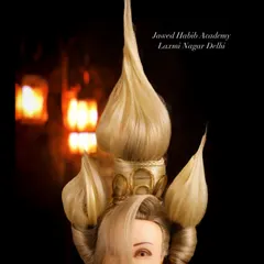 Inspired by architectural forms, this unique hairstyle demonstrates our students' ability to think outside the box and construct complex, gravity-defying designs.