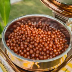 These bite-sized mini Gulab Jamuns are soaked in a fragrant sugar syrup and served warm. They may be small, but they pack a huge punch of flavor.