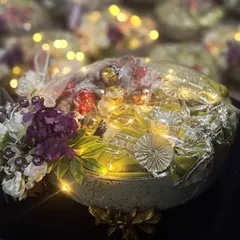A close-up of one of my illuminated gift hampers, ready for a bulk delivery. The warm glow of the fairy lights adds a touch of magic and elegance, making it a truly impressive gift for corporate clients or special occasions.