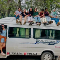 The journey is part of the adventure! Our group having fun on top of our traveler van in Kodaikanal. These are the memories that make a trip special.