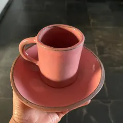 A perfectly pink, hand-built cup and saucer set. The rustic edge of the clay gives it so much character.
