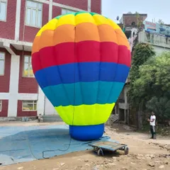 This huge, rainbow-colored hot air balloon inflatable is a classic choice for grabbing attention from a distance. It's perfect for large grounds, fairs, and outdoor events.