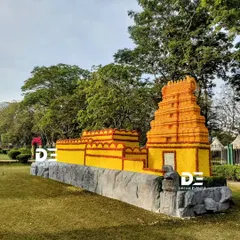 Another view of the floral temple installation, showing its impressive scale against the park's natural landscape. This piece of floral architecture was a central highlight of the public exhibition.