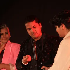 A close-up moment during my TEDx performance. This is where I use subtle mentalism techniques to create a personal connection, even in a large auditorium. It's about making every single person feel like they are part of the experience.