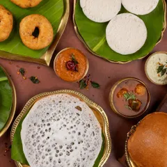 I believe in capturing the soul of a cuisine. This South Indian spread was styled to feel like a grand, authentic feast, with banana leaves and brassware that highlight the vibrant colours and textures of each dish.