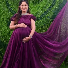 Capturing the beautiful flow of our designer gowns is part of the magic. This purple maternity gown comes with a long trail for those dramatic, memorable shots.
