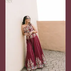 A stylish bride enjoying the carnival atmosphere. Shreya’s relaxed pose and cool sunglasses perfectly capture the fun, laid-back vibe of a pre-wedding carnival event.