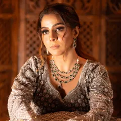 A stunning glam look created by a partner MUA, featuring my silver sequin lehenga and layered emerald necklace. This is the kind of high-quality result we can create together.
