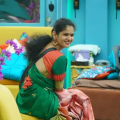 Chaitra Kundapura from Bigg Boss Kannada 11, looking cheerful in a green and pink saree with a custom blouse we designed for her.