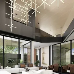 The double-height living space of the 'Trapezoidal House' is defined by a soaring oak veneer ceiling and a dramatic geometric chandelier. The design uses a clean white sofa and sculptural brown armchairs to create a sophisticated yet comfortable gathering area.