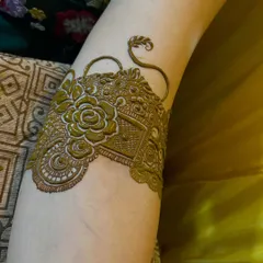 Another angle of the floral arm band, showing the detailed work.