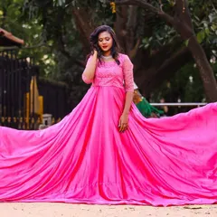 My flowing pink photoshoot gown is one of my most requested rental items for pre-wedding and maternity shoots. The long, dramatic trail creates incredible photos, and the vibrant color looks amazing against any backdrop. This is how you get those fairytale pictures without buying an expensive dress.