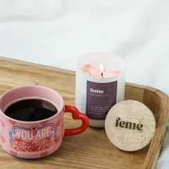 A cozy moment with our holographic jar candle and a sweet mug. The perfect setup for a Valentine's treat.