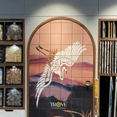 This arched tile mural features a graceful crane against a sunset, showcasing my ability to create custom art that blends elegance and nature. This piece, displayed in my showroom, highlights how artistic tiles can serve as a sophisticated alternative to traditional wall art.