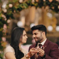 A close-up of the couple holding their engagement rings, a symbolic shot that we love to capture to mark the beginning of their journey.