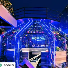 For the launch of Molecule Air Bar in Delhi, we integrated a mix of real and artificial plants into their futuristic bar structure. Hanging plants and floral arrangements soften the neon and metal framework, blending nature with modern design.