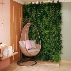 Who says green is only for the outdoors? I created this cozy reading corner by installing a lush, textured artificial plant wall. It adds a natural, calming element to the room and serves as a beautiful, maintenance-free feature wall.