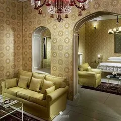 For the Nivah heritage property in Moradabad, I designed this wallpaper inspired by intricate Mughal jaali patterns. The golden motifs on the walls create a sense of quiet luxury, perfectly complementing the arched doorways and classic furniture of this historic space.