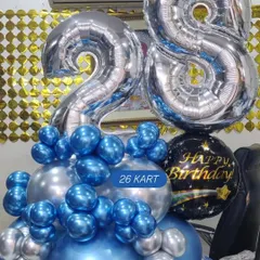 For this 28th birthday order, the client chose a striking blue and silver color scheme. I can create these number-based bouquets for any age or anniversary, and they serve as a great focal point for party decorations.