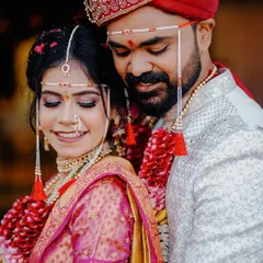 The quiet moments are just as important as the loud ones. Here, we captured the gentle affection between this beautiful couple during their traditional Marathi wedding ceremony.
