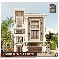 A neutral color palette, as shown in this classically inspired home with stone cladding, creates a calm, subtle, and sophisticated appearance.