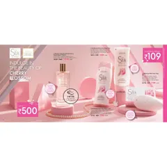 A product family shot for the 'Silk' cherry blossom collection, including perfume, lotion, and soap. The use of pink geometric shapes and a pearl necklace reinforces the brand's theme of indulgence.