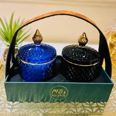 This elegant gift set features two of my crystal jar candles, in royal blue and black, presented in a custom tray with a leather handle. It's a popular choice for sophisticated Diwali gifts and corporate orders.