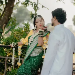 A playful moment between the couple during their Haldi ceremony. The bride blowing a kiss to her groom is a perfect candid shot, full of fun and love.