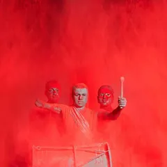 For this ABP Studios campaign, the concept was to use color as a raw, overwhelming force. The simple, toga-like drapes on the performers ensure the focus remains on the dramatic explosion of red powder, creating a powerful and symbolic visual.