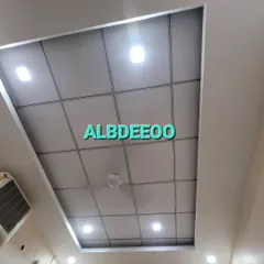 A clean and professional grid false ceiling we installed in an office. This type of ceiling is great for commercial spaces as it allows easy access to wiring and ventilation systems.