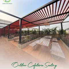 This outdoor cafeteria seating at Accenture was designed for daily use, providing a space for employees to connect with nature during their breaks. The pergola offers shade while the surrounding planters create a sense of privacy and enclosure.