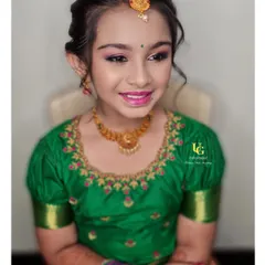 The stunning Poorvi, looking absolutely precious after her makeover. Her smile shows how much she loved her colorful eye makeup and the pretty pink lip color.