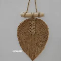 These pretty macrame leaves were part of a bulk order for a client who planned to stitch them onto a curtain. They are also very popular as small wall decor. I can make them in any shade to match your home.