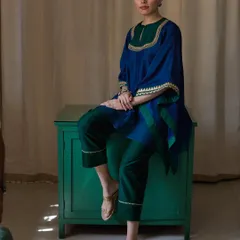 This shot for Bellerobe uses a pop of colour with the green cabinet to complement the royal blue and green of the contemporary kurti set. The composition is balanced and clean, making it ideal for e-commerce and lookbook photography.