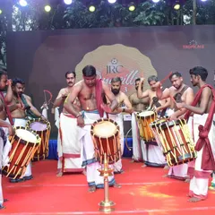 A dynamic performance at an Onam event in Carmelaram, Bangalore, with our Guru leading the ensemble on stage.