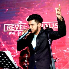 On stage at Revel Haus, connecting with the audience. I always try to make sure everyone feels the story I'm telling through the song.