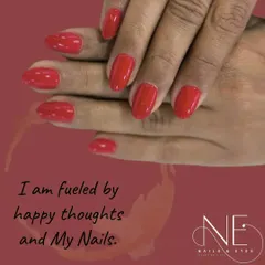 A simple, solid red manicure is always a good idea. This look is clean, classic, and effortlessly chic.